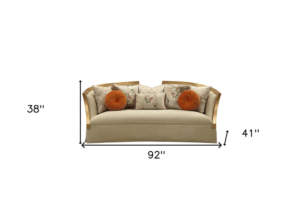 Valentina 92" Beige Velvet Curved Sofa with Nailhead Trim and Toss Pillows