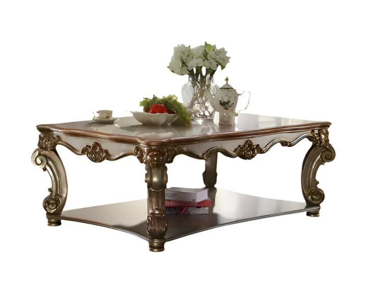 58-Inch Gold Wood Coffee Table with Shelf and Ornate Detailing