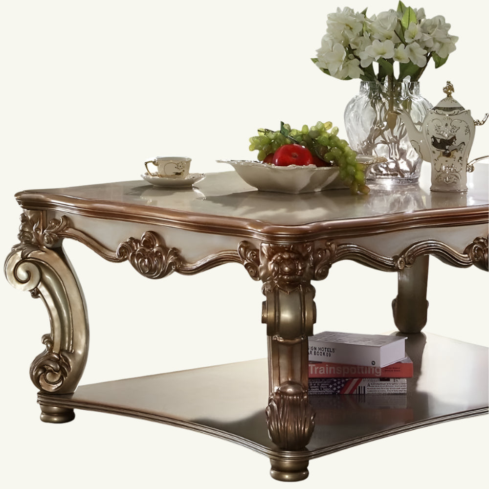 58-Inch Gold Wood Coffee Table with Shelf and Ornate Detailing