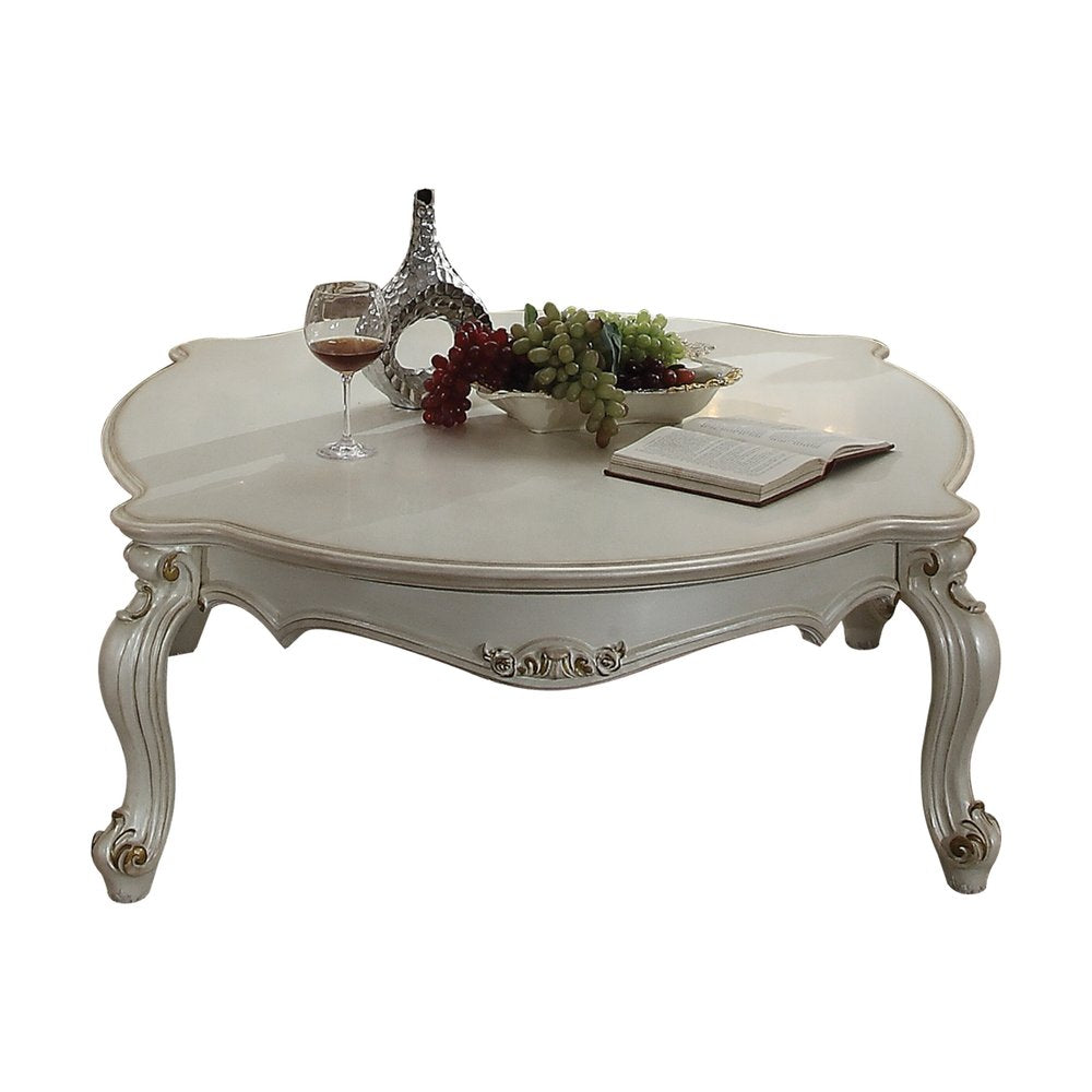 54-Inch Pearl Wood and Polyresin Coffee Table with Queen Anne Detailing