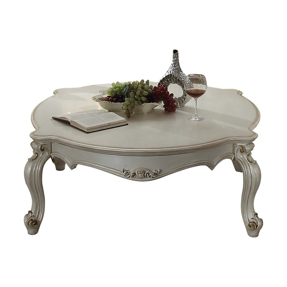 54-Inch Pearl Wood and Polyresin Coffee Table with Queen Anne Detailing