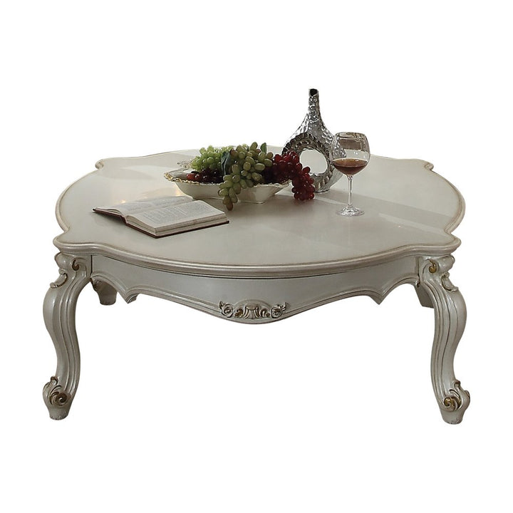 54-Inch Pearl Wood and Polyresin Coffee Table with Queen Anne Detailing
